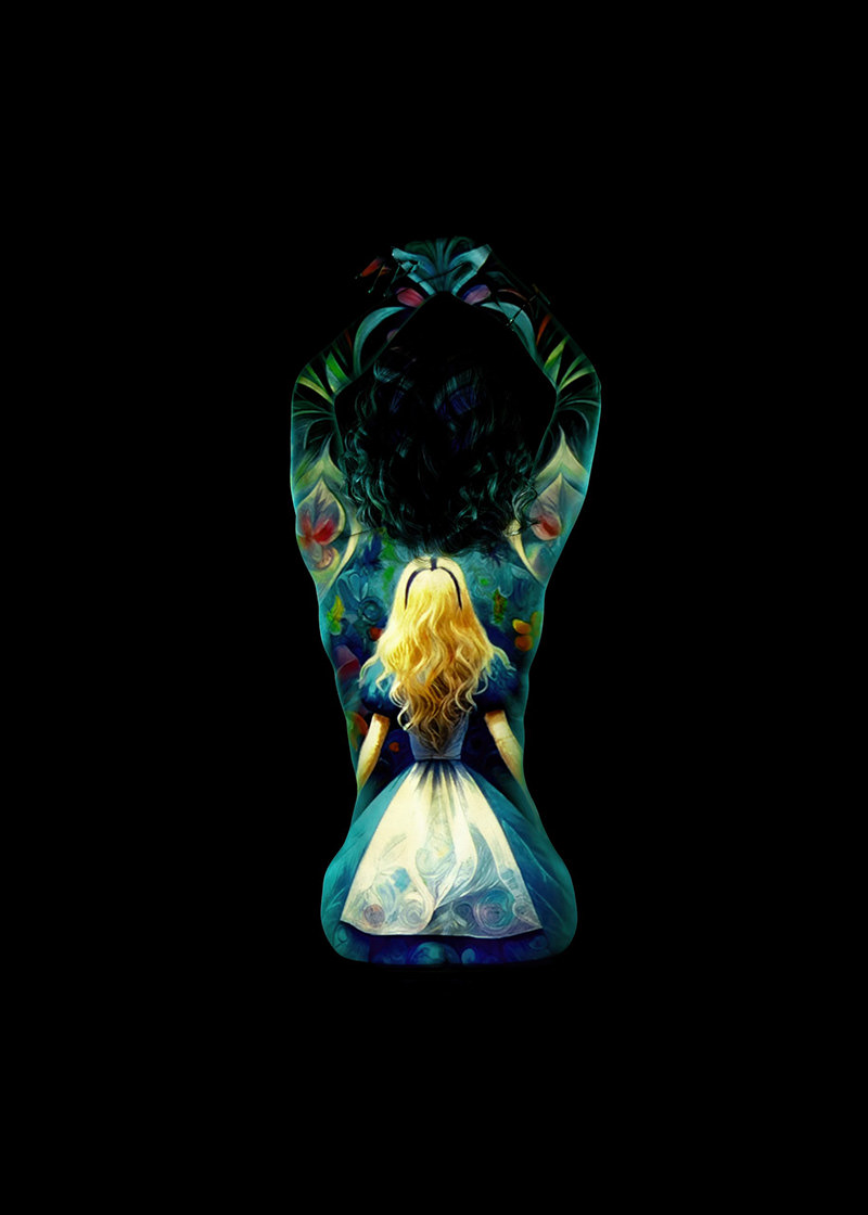 Person with arms raised and hands clasped above head, body painted with colorful artwork depicting Alice in a blue dress with blonde hair against a dark background