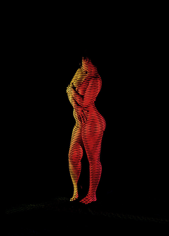Nude standing person with arms crossed, illuminated by red and yellow zigzag light projections against a black background