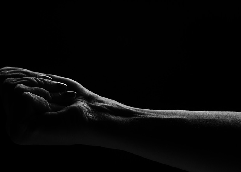 Bodyscape hands clasped connection