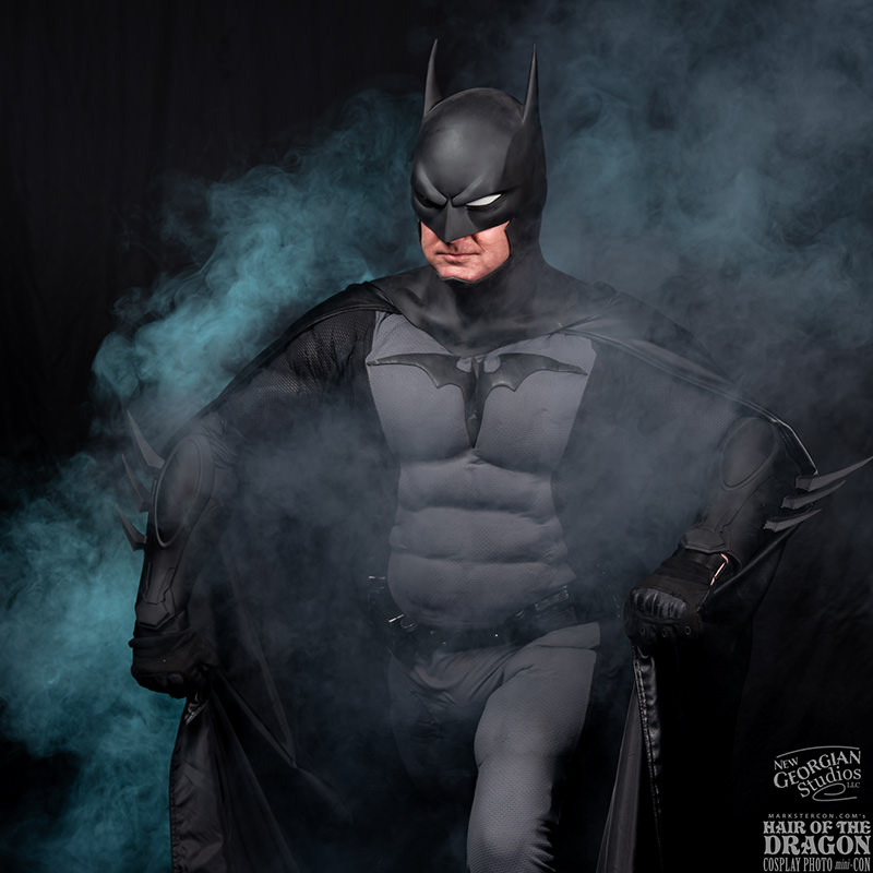 Cosplay dark knight emerges mist